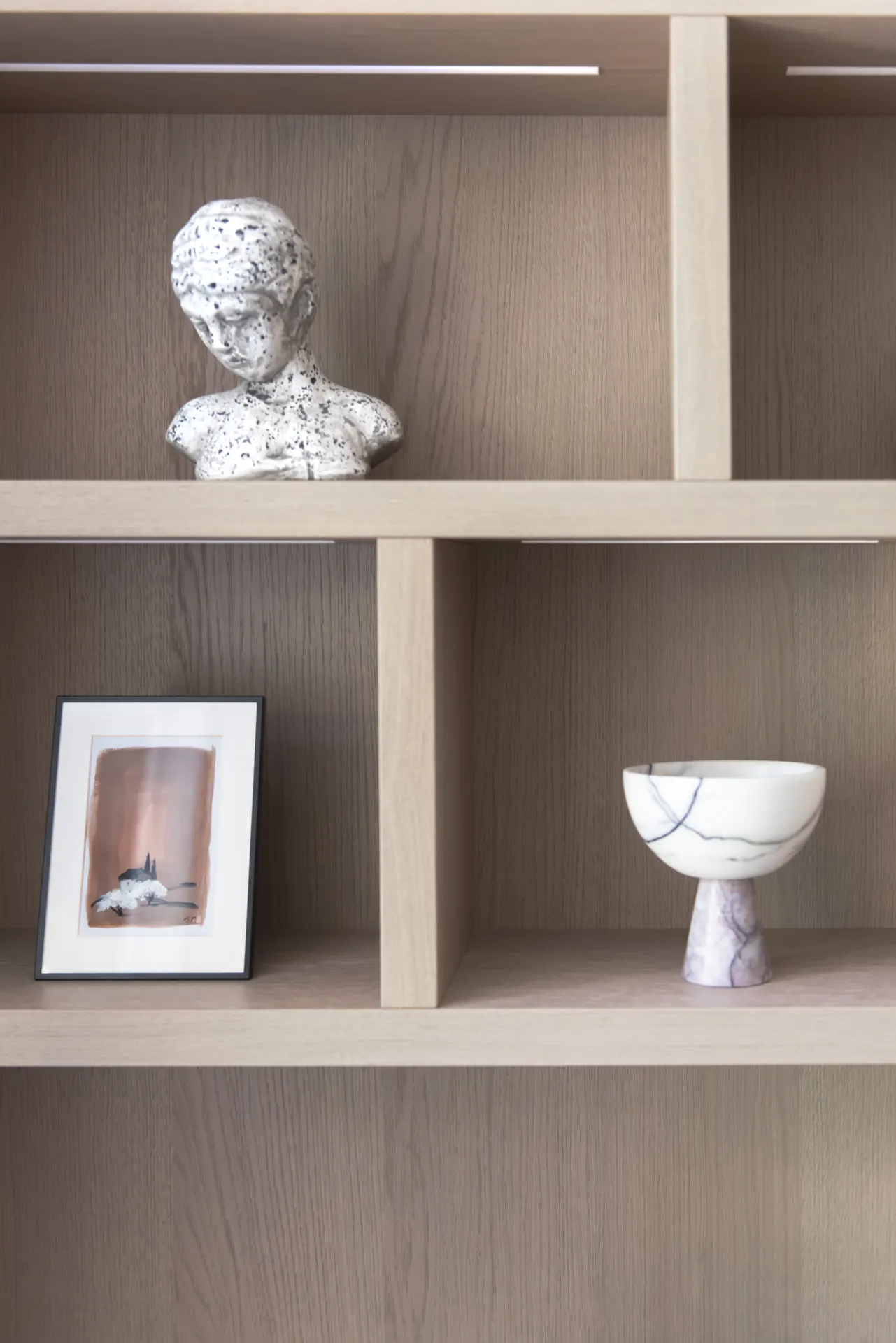 Timber shelving and integrated lighting in Nura’s Westover Road joinery project