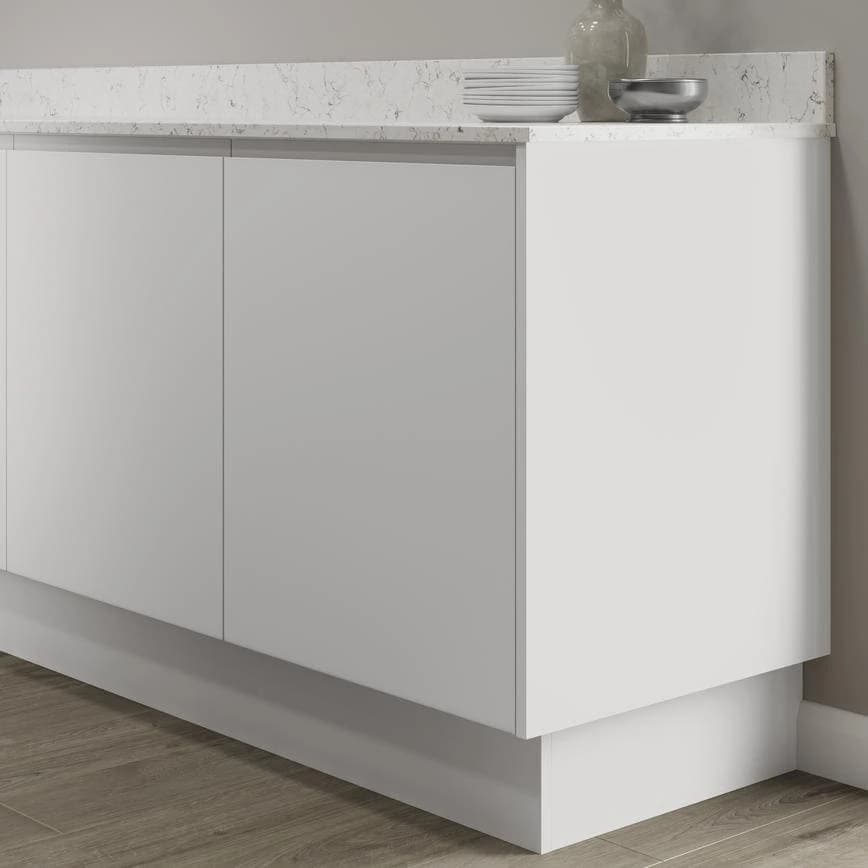 White base cabinets with a recessed white plinth