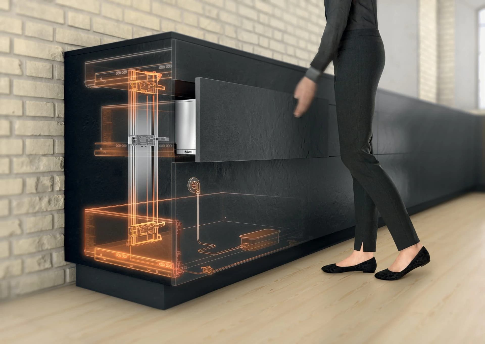 Person operating a cabinet with an illuminated mechanism graphic
