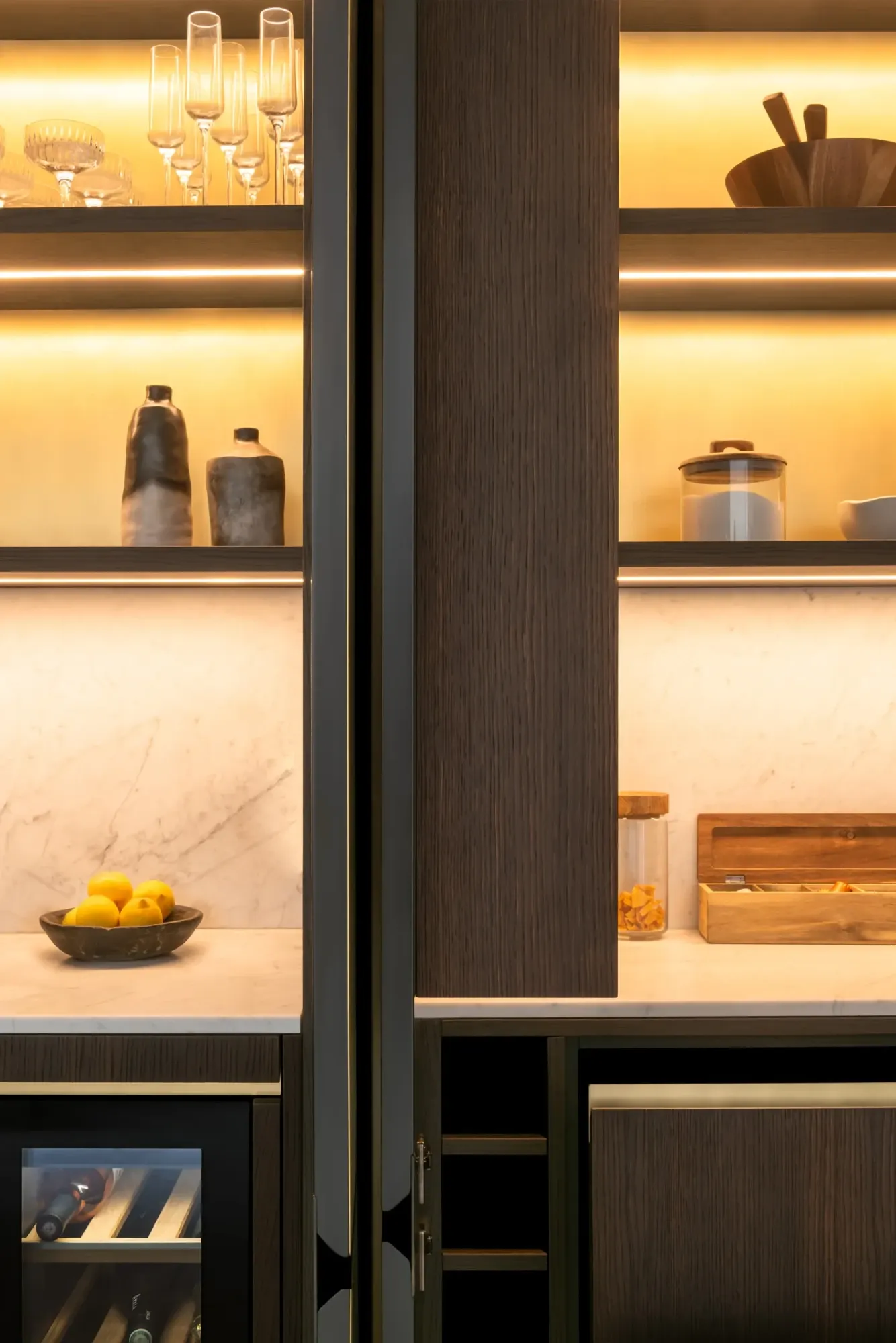 Westover Road joinery with illuminated shelving, dark timber and marble surfaces